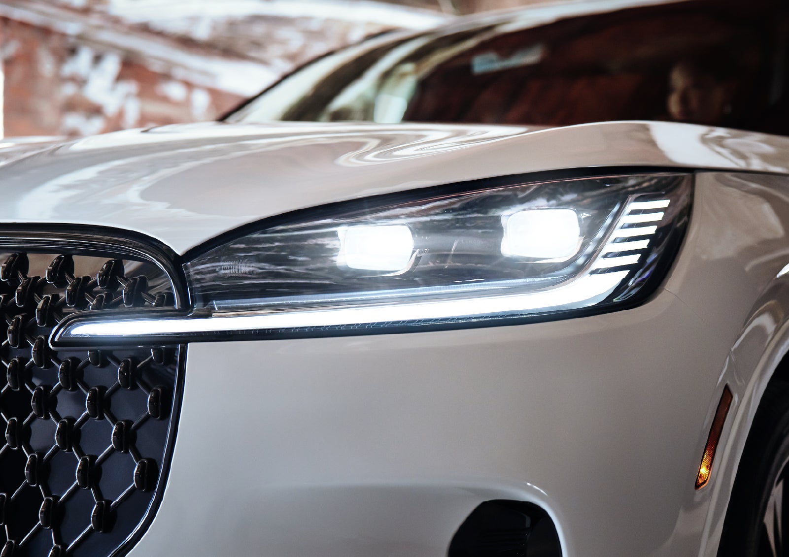 A close-up of a headlamp on the 2027 Lincoln Aviator® SUV is shown. | South Bay Lincoln in Hawthorne CA