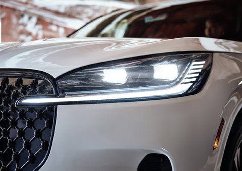 A close-up of a headlamp on the 2027 Lincoln Aviator® SUV is shown. | South Bay Lincoln in Hawthorne CA