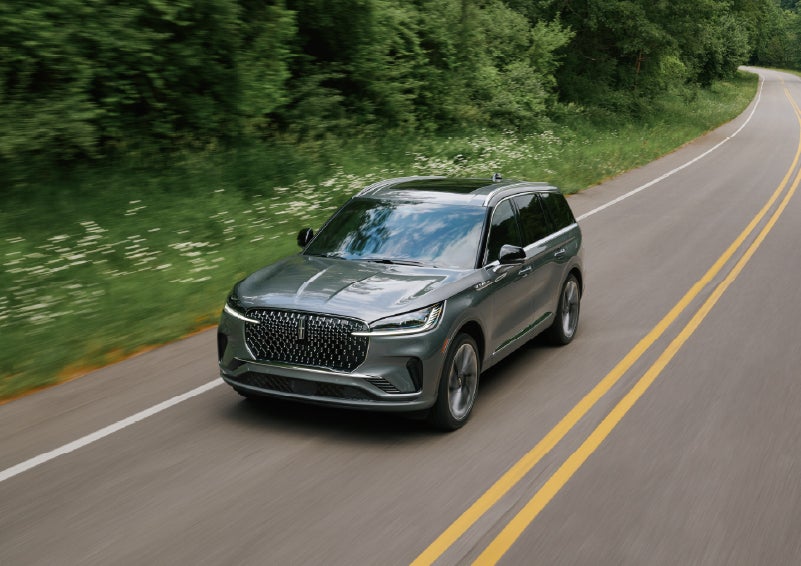 A 2027 Lincoln Aviator® SUV is being driven down a road. | South Bay Lincoln in Hawthorne CA