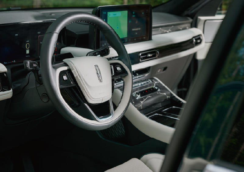 The leather-trimmed steering wheel of a 2027 Lincoln Aviator® Black Label™ SUV. | South Bay Lincoln in Hawthorne CA