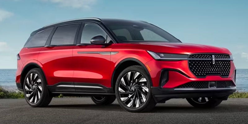 Side view of the 2024 Lincoln Nautilus parked on a road.